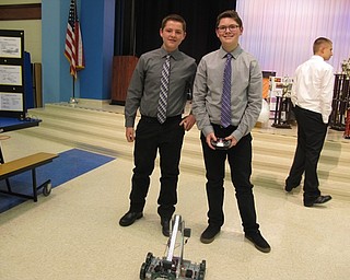 Neighbors | Alexis Bartolomucci.Ryan and Joey operated one of the robots they created while in the STEM program at Austintown Middle School.