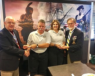 Neighbors | Submitted.Pictured are, from left, Phil Bracy, Mahoning Valley Chapter President, Ron Smith and Patricia Sexton co-founders of the"Wall" and Ohio State Treasurer and Northeastern Chapter President Steve Hinson presenting Fort Lauren coins.