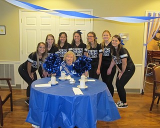 Neighbors | Alexis Bartolomucci.Sara Hill-Strock took a picture with the Poland High School cheerleaders on May 1 after a surprise pep rally at Shepherd of the Valley.