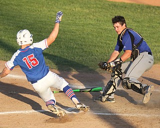 William D. Lewis The Vindicator Western Reserve's Garrett Milhalick(15) is out at the plate as Jax Milton Catcher Noah LAaster(5) makes the tag)  in 11 inning game with Jackson Milton at Cene 5-19-17
