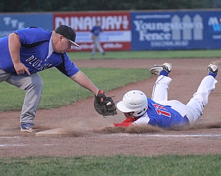 William D. Lewis The Vindicator Western Reserve'sMatt Burcaw(11) gets back to 1rst safe as JAX Miltons Zach Socha(55) tries to make the tag in 11 inning game with Jackson Milton at Cene 5-19-17.