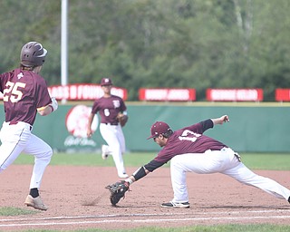 Boardman first baseman Evan Knaus(17) leans down for the out as Brendan Regan(25) of Walsh Jesuit runs towards first during the 1st inning as the Boardman takes on Walsh Jesuit in the Division I District final, Friday, May 19, 2017 at Bob Cene Park in Struthers...(Nikos Frazier | The Vindicator)..