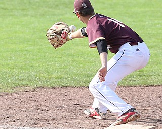 Walsh Jesuit first baseman Kevin Jarvis(14) leans down for the out during the 2nd inning as the Boardman takes on Walsh Jesuit in the Division I District final, Friday, May 19, 2017 at Bob Cene Park in Struthers...(Nikos Frazier | The Vindicator)..