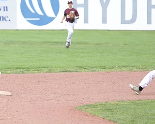 Boardman second baseman Dom Stilliana(7) leans down for the out as Walsh runner Matt Lobeck(16) slides into second during the 7th inning as the Boardman takes on Walsh Jesuit in the Division I District final, Friday, May 19, 2017 at Bob Cene Park in Struthers...(Nikos Frazier | The Vindicator)..