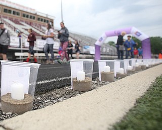 Candles for the luminary during the Relay for Life event at Boardman Spartan Stadium, Friday, May 19, 2017 in Boardman. ..(Nikos Frazier | The Vindicator)