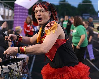 Brian "Fiona Fire Cracker" Patterson of New Castle, runs around raising money while participating in the  "Miss Relay"  during the Relay for Life event at Boardman Spartan Stadium, Friday, May 19, 2017 in Boardman. ..(Nikos Frazier | The Vindicator)