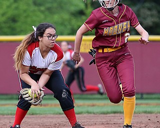 MICHAEL G TAYLOR | THE VINDICATOR- 05-19-17 SOFTBALL D3 Cardinal Mooney Cardinals vs Columbiana Clippers at South Range High School in South Range, OH.  4th inning, Columbiana's #14 Gillian Stilson fields the grounder as Mooney's #2 Gia DiFabio runs.