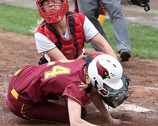 MICHAEL G TAYLOR | THE VINDICATOR- 05-19-17 SOFTBALL D3 Cardinal Mooney Cardinals vs Columbiana Clippers at South Range High School in South Range, OH. 7th iinning, Columbiana's #18 Alexis Cross tags out Mooney's #24 Kelly Williams for the final out of the inning.