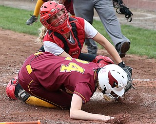 MICHAEL G TAYLOR | THE VINDICATOR- 05-19-17 SOFTBALL D3 Cardinal Mooney Cardinals vs Columbiana Clippers at South Range High School in South Range, OH. 7th iinning, Columbiana's #18 Alexis Cross tags out Mooney's #24 Kelly Williams for the final out of the inning.