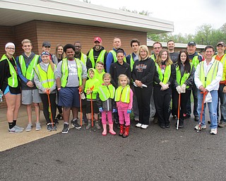 SPECIAL TO THE VINDICATOR
Members of the Austintown Rotary and the Fitch Interact Club joined forces in the inclement weather to cleanup Kirk Road. The Green Team of Mahoning County has sponsored many of these efforts in the past 18 years. In front, from left, are Reagan Kalaher, Collin Kalaher, Quinn Laraway and Josie Laraway; in the middle, Dana Scott, Isaiah Batchelor, Stephanie Fabian, Tracie Kaglic, Allie Kaglic, Dannah Lewis and Mitchell Dalvin; and in back, Erica DiFrancesco, Timmy Kubacki, Rachael DiFrancesco, Gina DiFrancesco, Jeremy Batchelor, Ed Kalaher, Brian Frederick, Daniel Frederick, Ron Carroll, Rich Begalla, Mal Culp and Brian Laraway. Interact advisers are Tina Kubacki and Gary Reel.