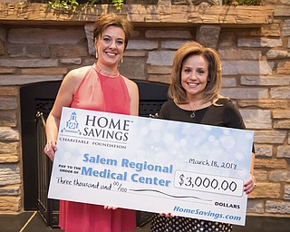 SPECIAL TO THE VINDICATOR
The Home Savings Charitable Foundation donated a check for $3,000 to Salem Regional Medical Center from the Hearts and Stars Gala that took place in March. The proceeds will be used to update the patient-care equipment and resources for facility expansion. From left, are Julie Needs, branch manager, Home Savings Salem office, and Dr. Anita Hackstedde, SRMC president/CEO.