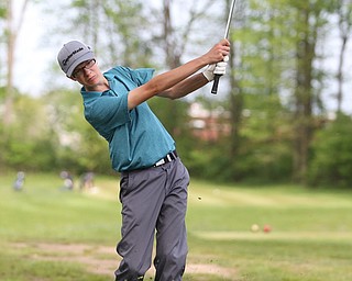 Justin Atkinson(U-17) chips the ball on the 14th hole during the 2017 Vindicator Greatest Golfer Junior Qualifier, Saturday, May 20, 2017 at Pine Lakes Golf Course in Hubbard...(Nikos Frazier | The Vindicator)..