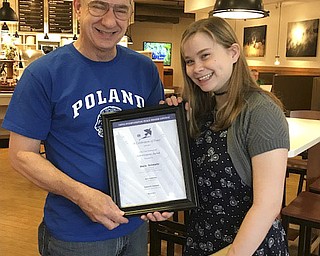 SPECIAL TO THE VINDICATOR
Poland Lions International Peace Poster winner was Maria Schwartz. Dave Rudawsky of Poland Lions Club, above, left, presented Schwartz with a certificate for winning the club’s 10th local competition. The theme for the 2017-18 contest is “The Future of Peace.” For information on the upcoming fall contest, visit www.lionsclub.org.