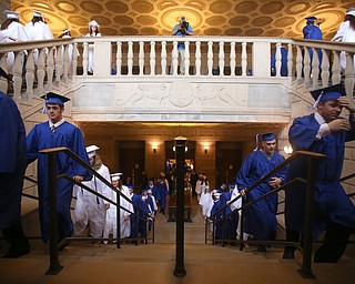 Students walk up the stairs before the Hubbard High School Commencement at Stambaugh Auditorium, Wednesday, May 24, 2017 in Youngstown.  ..(Nikos Frazier | The Vindicator)