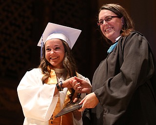 Alaina Colella receives her diploma from Principal Brandie Yobe during the Hubbard High School Commencement at Stambaugh Auditorium, Wednesday, May 24, 2017 in Youngstown.  ..(Nikos Frazier | The Vindicator)