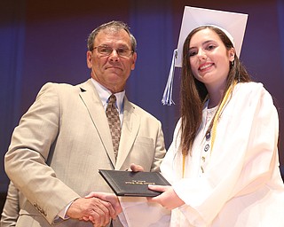 Board Member Don Newell presents Alexandria Chiaberta with her diploma during the Hubbard High School Commencement at Stambaugh Auditorium, Wednesday, May 24, 2017 in Youngstown.  ..(Nikos Frazier | The Vindicator)