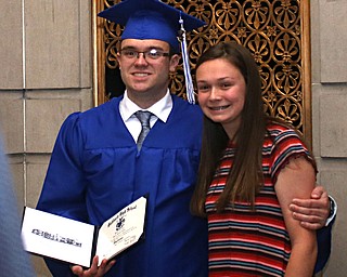 Jared Adler poses for a photo with his sister Jackie(15) after the Hubbard High School Commencement at Stambaugh Auditorium, Wednesday, May 24, 2017 in Youngstown.  ..(Nikos Frazier | The Vindicator)