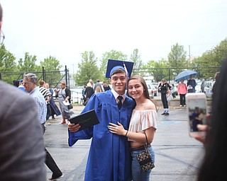 David Brown poses with his girlfriend, Aspen Bell after the Hubbard High School Commencement at Stambaugh Auditorium, Wednesday, May 24, 2017 in Youngstown.  ..(Nikos Frazier | The Vindicator)
