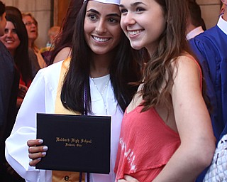 Alexa Lynch(left) poses with her friend Ally Petro after the Hubbard High School Commencement at Stambaugh Auditorium, Wednesday, May 24, 2017 in Youngstown.  ..(Nikos Frazier | The Vindicator)