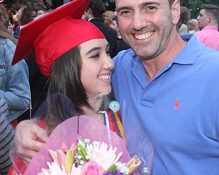 William D Lewis the vindicator Niles grad Mia Salvato and her dad Larry Salvato embrace after 5-24-17 commencement at Packard Music Hall in Warren.