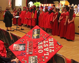 William D Lewis the vindicator Niles grad Toni Scanlon sends a message on her cap as the Niles McKinley Belles and Beaux sing during 5-24-17 comencement t Packard Music Hall in Warren.