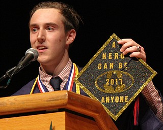 William D Lewis the vindicator Austine Cline, one of three Niles HS valedictorians, displays a message on his cap while delivering a speech during 5-24-17 commencement at Packard Music Hall in Warren.