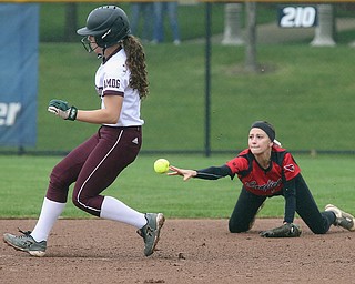 Walsh Jesuit's Kristen Kuhrt beats the throw of Canfield second baseman Maura Kennedy in the 2nd inning of a Division I regional semifinal game at Lee Jackson Field on Wednesday, May 24, 2017 in Akron, Ohio. (Phil Masturzo/Akron Beacon Journal)