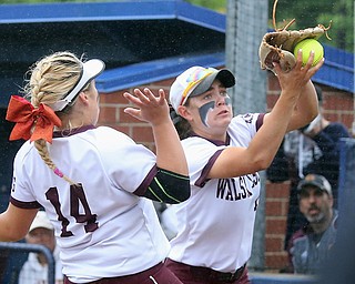 Walsh Jesuit first baseman Jessica Huth makes the catch on a foul ball by Canfield's Sidney Lambert in the 2nd inning of a Division I regional semifinal game at Lee Jackson Field on Wednesday, May 24, 2017 in Akron, Ohio. (Phil Masturzo/Akron Beacon Journal)