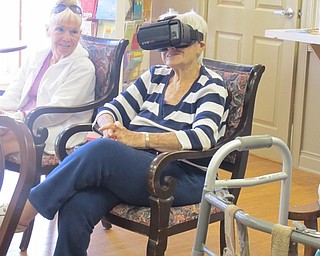 Neighbors | Alexis Bartolomucci.A Commons at Greenbriar resident was able to explore the Eiffel Tower using virtual reality on April 18.