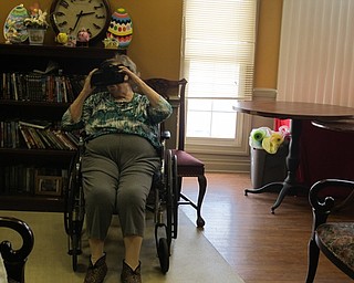 Neighbors | Alexis Bartolomucci.One of the Commons at Greenbriar residents explored the Milky Way Galaxy using virtual reality on April 18.