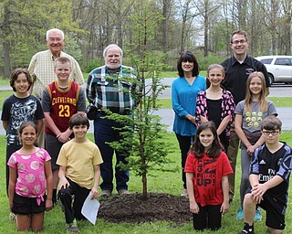 Neighbors | Abby Slanker.C.H. Campbell Elementary fourth-grade students gathered around the Dawn Redwood tree which was planted in front of the school to celebrate Earth Day on April 28. Joining the students were, from left, (back) Canfield Mayor Bernie Kosar Sr., Chairman and Secretary of the Canfield Parks, Recreation and Cemetery Board J.T. Whitehouse, Canfield Parks, Recreation and Cemetery Board member Enid Moldonado and C.H. Campbell Elementary School Principal Travis Lavery.