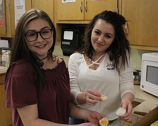 Neighbors | Abby Slanker.Two Canfield High School students in Terri Dance’s Nutrition and Wellness class helped make nut kolache during a visit from Margaret Stanko, a retired family and consumer science teacher, on April 11.