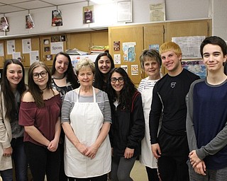 Neighbors | Abby Slanker.Margaret Stanko (center), a retired family and consumer science teacher, visited Canfield High School students in Terri Dance’s Nutrition and Wellness class to demonstrate how to make an Easter favorite, nut kolache, on April 11.