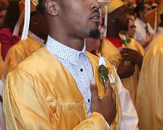 Alvin Salter Jr. places his hand on his chest during the national athem at the Warren G. Harding High School Commencement at W.D. Packard Music Hall, Thursday, May 25, 2017 in Warren.  ..(Nikos Frazier | The Vindicator)