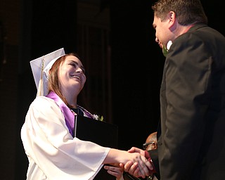 Isabella Van Kirk shakes Superintendent Steve Chiaro's hand after receiving her diploma during the Warren G. Harding High School Commencement at W.D. Packard Music Hall, Thursday, May 25, 2017 in Warren.  ..(Nikos Frazier | The Vindicator)