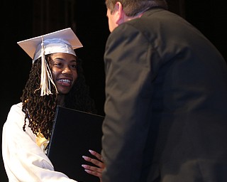 Kyla Bossard shakes Superintendent Steve Chiaro's hand after receiving her diploma during the Warren G. Harding High School Commencement at W.D. Packard Music Hall, Thursday, May 25, 2017 in Warren.  ..(Nikos Frazier | The Vindicator)
