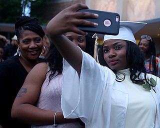 Keausha Jenkins(right) takes a selfie with her mom, Alethea Jenkins(center) and grandmother, Thelma Jenkins(left) after the Warren G. Harding High School Commencement at W.D. Packard Music Hall, Thursday, May 25, 2017 in Warren.  ..(Nikos Frazier | The Vindicator)