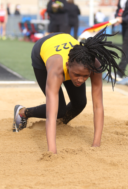 Warren Harding's Amisha Moore(122) competes in the girls long jump final during the Division 1 Region 1 Track & Field Championships, Friday, May 26, 2017 at Austintown High School in Austintown...(Nikos Frazier | The Vindicator)..