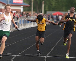 Warren Harding's Sterling Frazier(118)(center) competes in the boys 4x100 meter relay final during the Division 1 Region 1 Track & Field Championships, Friday, May 26, 2017 at Austintown High School in Austintown...Glenoak's Tate Rhoads(left) and Cleveland Height's Zaire Webb(right)..(Nikos Frazier | The Vindicator)..