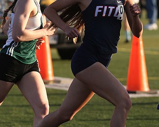 Austintown's Lauren Dolak(120)(right) competes in the girls 800 meter run final during the Division 1 Region 1 Track & Field Championships, Friday, May 26, 2017 at Austintown High School in Austintown. Dolak finished first...(Nikos Frazier | The Vindicator)..