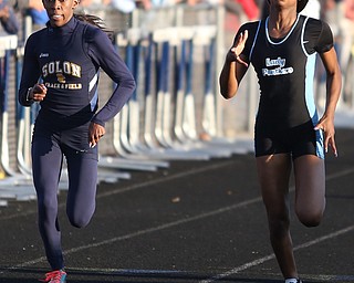 East's Jahniya Bowers(701)(right) competes in the girls 200 meter dash final during the Division 1 Region 1 Track & Field Championships, Friday, May 26, 2017 at Austintown High School in Austintown...Solon's Allison Vason(622)(left)..(Nikos Frazier | The Vindicator)..