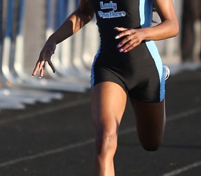 East's Jahniya Bowers(701)(right) competes in the girls 200 meter dash final during the Division 1 Region 1 Track & Field Championships, Friday, May 26, 2017 at Austintown High School in Austintown...(Nikos Frazier | The Vindicator)..