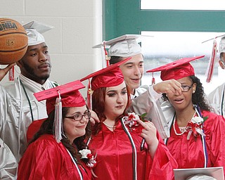        ROBERT K. YOSAY  | THE VINDICATOR..The last class of VPA/Stem Graduated at Chaney High School Friday afternoon ..Ò..A memory.. as a  group of students pose for a photo before the commencement services