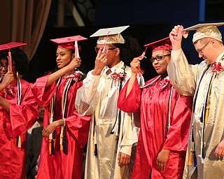        ROBERT K. YOSAY  | THE VINDICATOR..The last class of VPA/Stem Graduated at Chaney High School Friday afternoon ..Ò..Mortarboard Ceremony - Class officers for chaney lead the class on changing the mortarboard