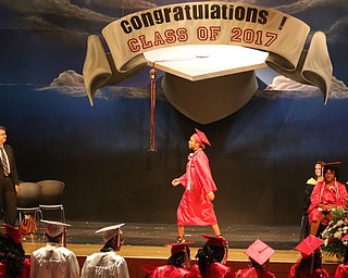        ROBERT K. YOSAY  | THE VINDICATOR..The last class of VPA/Stem Graduated at Chaney High School Friday afternoon ..Ò.Nautica Wright  takes her walk .. to get her diploma