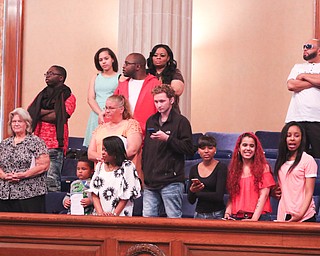        ROBERT K. YOSAY  | THE VINDICATOR..Pride emanated from the Stambaugh Auditorium Friday morning as 189 East High students celebrated their last hurrah of high school.- Jim Tressel main speaker.Ò...Gallery watching the students and the ceremonies