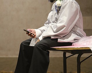        ROBERT K. YOSAY  | THE VINDICATOR..Pride emanated from the Stambaugh Auditorium Friday morning as 189 East High students celebrated their last hurrah of high school.- Jim Tressel main speaker.Ò.