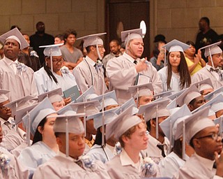        ROBERT K. YOSAY  | THE VINDICATOR..Pride emanated from the Stambaugh Auditorium Friday morning as 189 East High students celebrated their last hurrah of high school.- Jim Tressel main speaker.Ò.