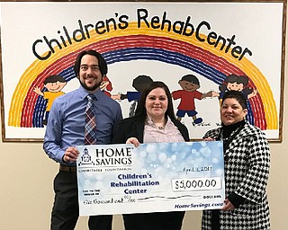 SPECIAL TO THE VINDICATOR: 
The Home Savings Charitable Foundation recently donated $5,000 to the Children’s Rehabilitation Center, used to sponsor the Reds, Whites and Brews event in April. Above, from left, are Michael Crogan Jr., executive director of CRC; Traci Vigorito, retail manager, Home Savings Howland; and Nancy Tabor, Trumbull County area manager, Home Savings. For information about the center, call 330-856-2107.