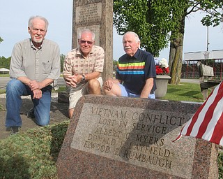 William D. Lewis The Vindicator Brothers of Don Layfield of Leavittsburg, who was killed in 1970 in Vietnam, are, from left,  Ron, John and Russell Layfield. They are pictured near a monument to war dead in Leavittsburg. Don's name is on the monument.